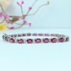 JR9898 12.0 Carat Ruby Oval and Diamond Tennis Bracelet in 18k White Gold